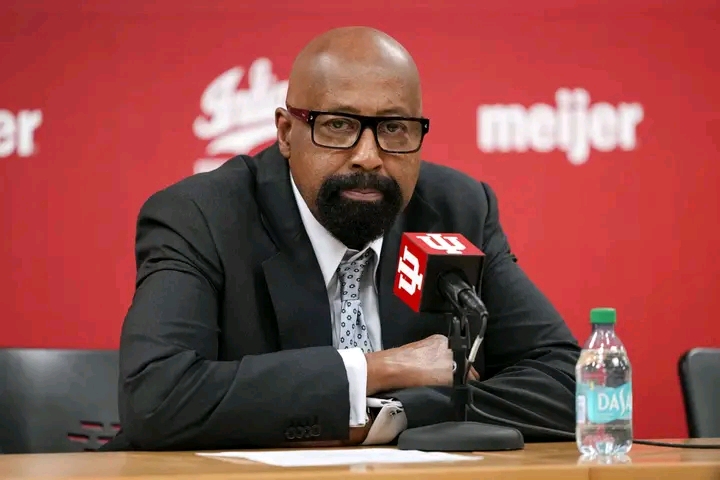 Bloomington, IN – Following a four-hour board meeting held earlier today, Indiana Hoosiers men’s basketball head coach Mike Woodson’s future with the program remains uncertain. Emerging from the meeting, a visibly emotional Woodson addressed the media, pleading for another season to address the team’s recent struggles and apologizing to players, staff, and fans for the team’s disappointing performance – “I understand the disappointment,” Woodson stated, his voice thick with emotion. “We didn’t meet expectations this year, and for that, I apologize to the players, the staff, and most importantly, to the Hoosier faithful. This program deserves better, and……
