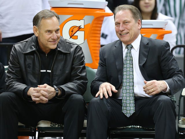 ESPN report sparks criticism of Michigan State athletics, placing coaches Mark Dantonio and Tom Izzo under scrutiny for their roles in alleged program misconduct.