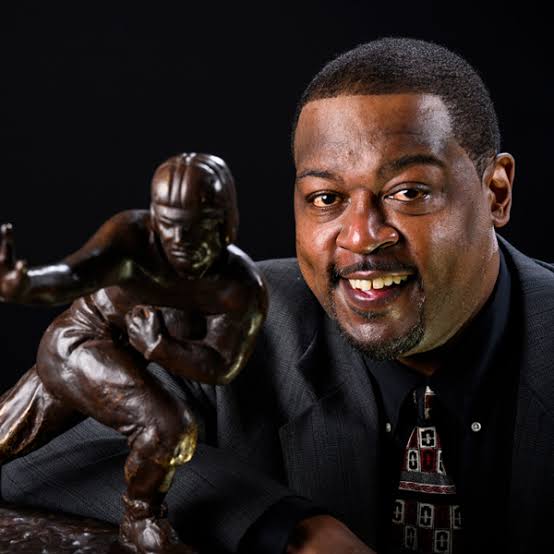 BREAKING NEWS: Ron Dayne, the legendary Wisconsin Badger and 1999 Heisman Trophy recipient, is making a triumphant return to the football program—this time taking on a prominent leadership role. The team has officially revealed that Dayne, the renowned former wide receiver, will rejoin the organization in 2025 as the new……………