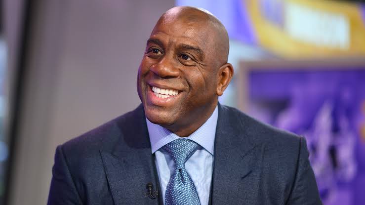 Magic Johnson Stuns Michigan State with Game-Changing Gift: Donates Two Custom Luxury Buses to Spartans Football…………..